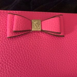 Brand new zippered wallet in pretty pink color